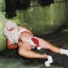 Babbo Natale sbronzo nudo con cappello